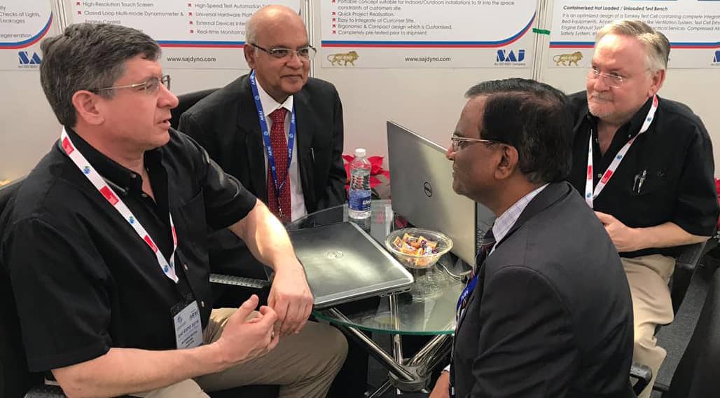 Dyno One staff member talking with customer